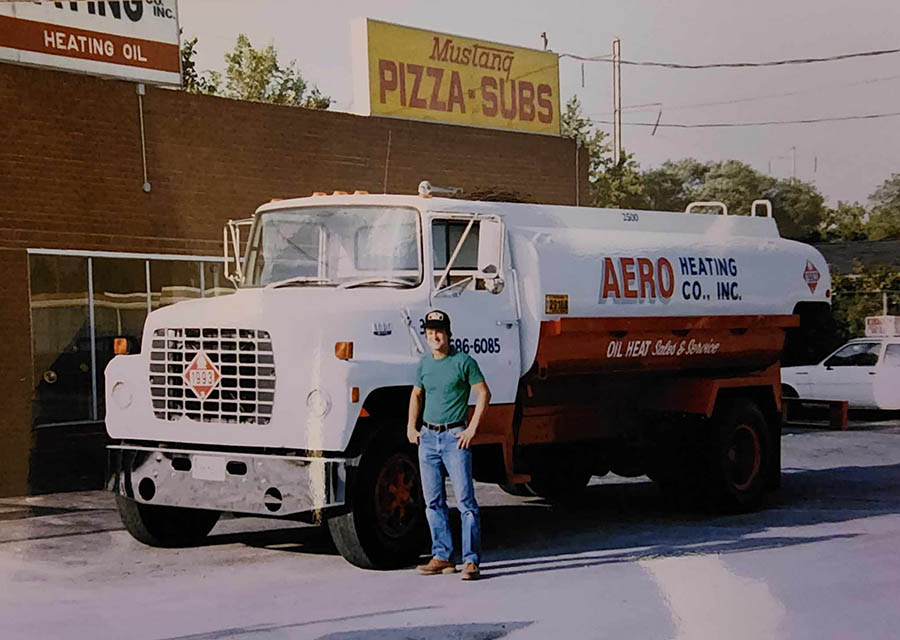 Old picture of H.F. Horney fuel delivery truck and employee