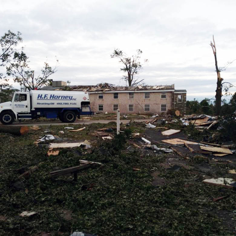 Fuel delivery truck in tropical storm damage